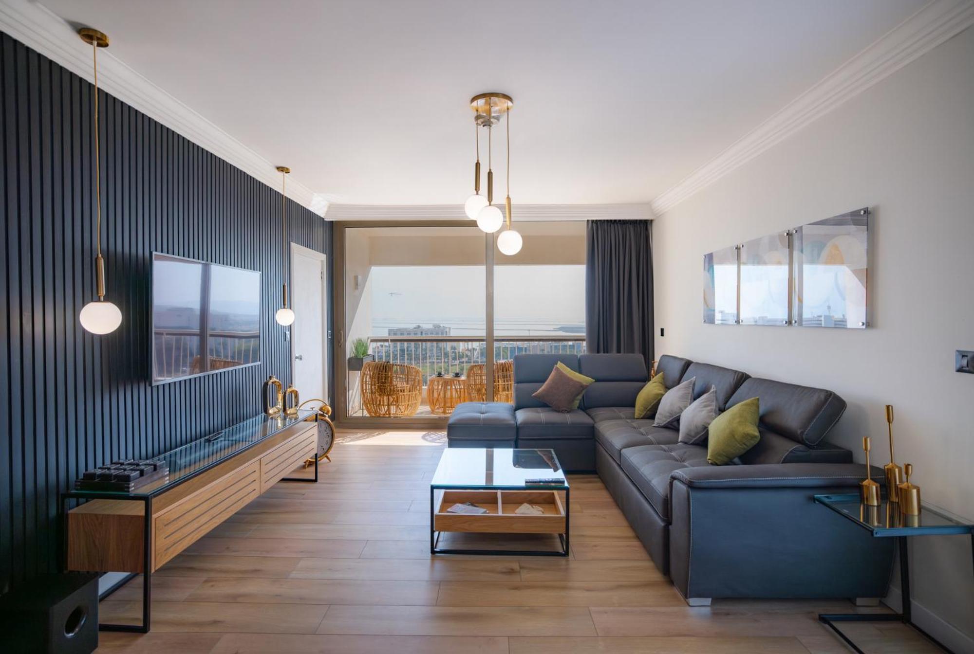 David Dead Sea Resort & Spa Ейн Бокек Екстериор снимка A living room in a modern apartment